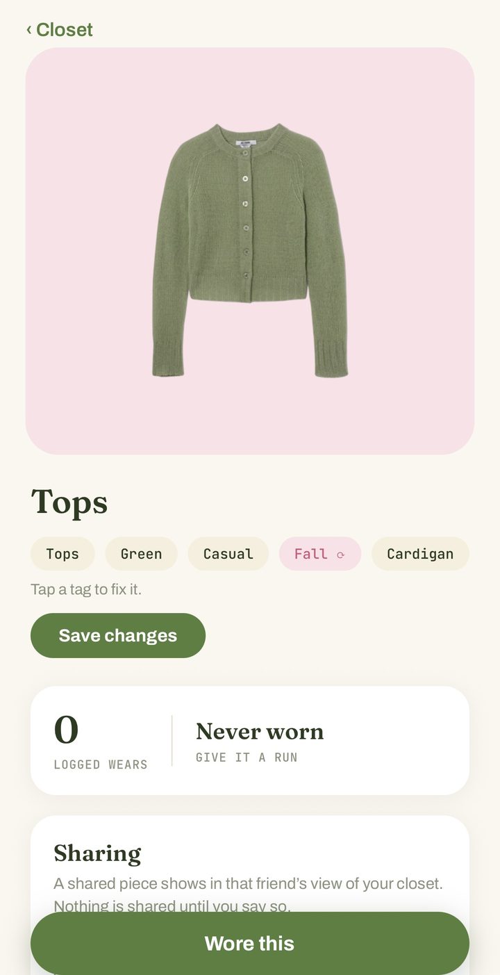 A green cardigan in Volley, tagged Tops, Green, Casual, Fall, Cardigan, with a line reading tap a tag to fix it.